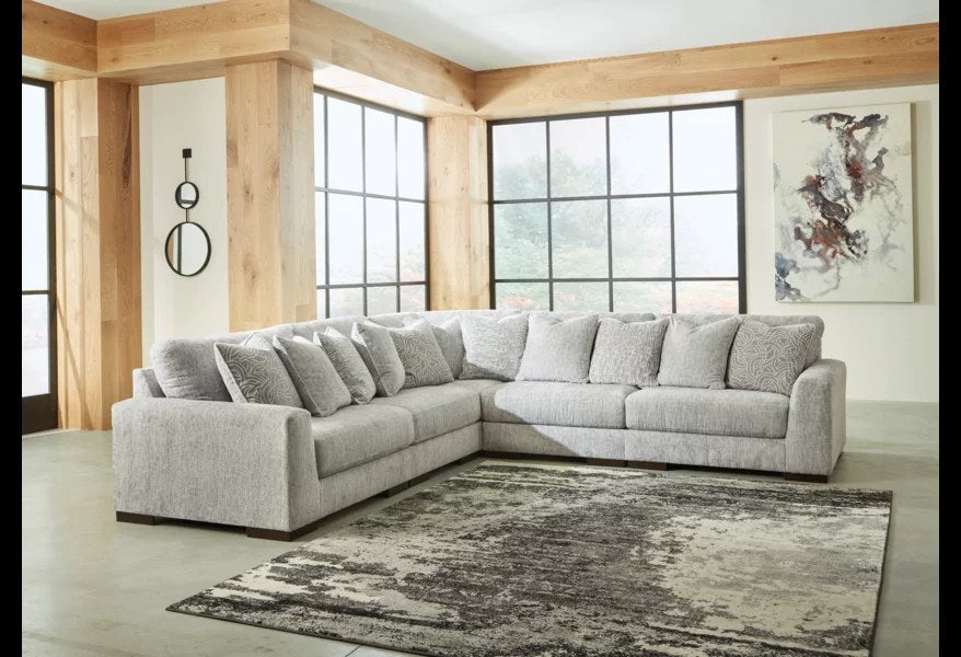 Ashley Regent Park Pewter five-piece modular sectional with two armless chairs and corner wedge in room