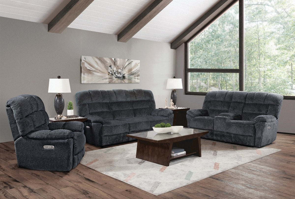The complete reclining living room set, showcasing a power recliner chair, a console loveseat, and a second power recliner, all upholstered in a dark gray textured fabric within a contemporary living space.
