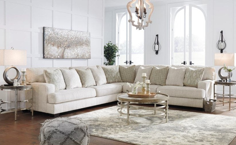 Ashley Rawcliffe Parchment three-piece room arrangement with separately sold ottoman; the sold four-piece set adds an armless chair