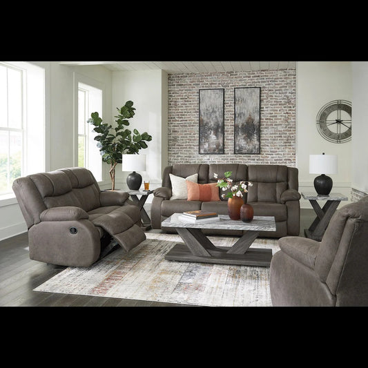 Main view showcasing the Ashley Reclining Loveseat from a balanced, frontal angle in a styled living room.