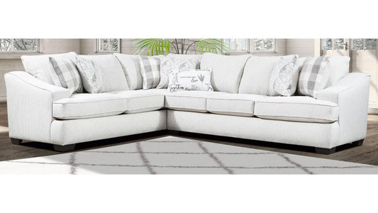 {'index': 2, 'type': 'main', 'description': 'Full view of a light-colored, L-shaped sectional sofa in a bright living room setting, showcasing its modern design and accent pillows.'}