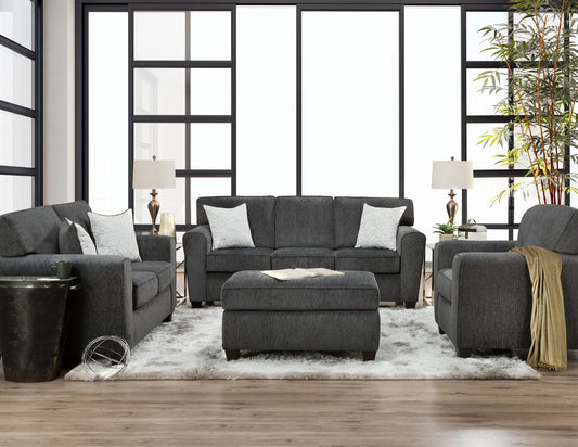 Main view of the sofa, accompanied by a matching loveseat and armchair, showcasing the contemporary design and Tofi Kohl fabric in a brightly lit, modern living room.