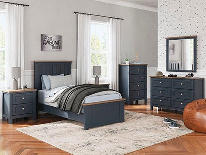 Full view of the bed frame with its distinctive paneled headboard and footboard, showcasing the elegant navy blue finish and contrasting wood-tone accents.