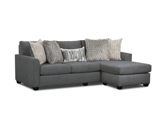 Full front view of the gray fabric sofa chaise, showcasing its complete length and throw pillows.