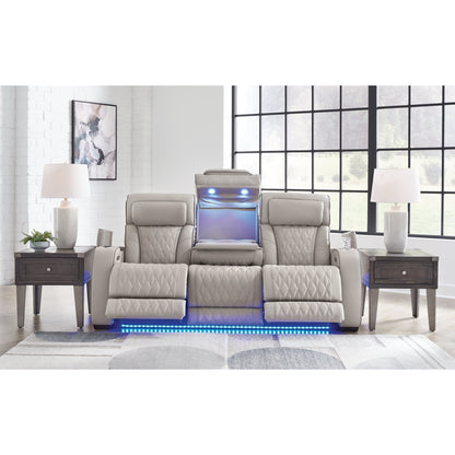 Ashley Boyington U2710518 gray leather-match power reclining loveseat with console in a room setting