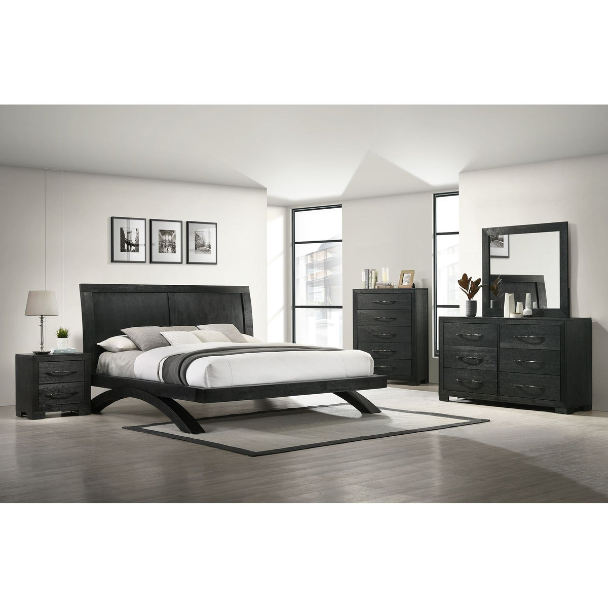 A detailed close-up of the Elements International Vertical Mirror, showcasing its sturdy rectangular frame with a textured dark gray finish, mounted atop a matching dresser.