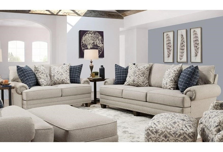 Comprehensive view of the Franklin Otto living room set, showcasing the sofa, loveseat, and matching ottoman in a stylish room setting.