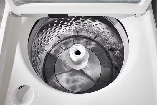 Maytag MTW5205TW washer with lid open, showing the stainless steel basket and agitator