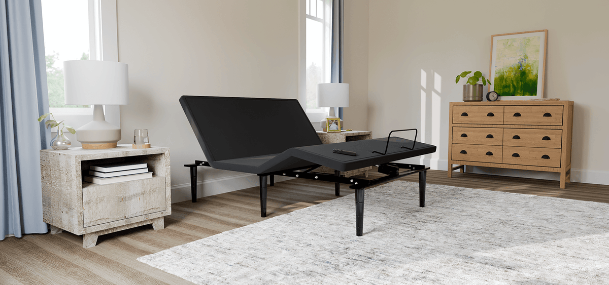 Sealy Ease power base without mattress in a styled room; photographed size may differ from selected size