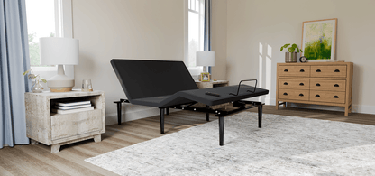Sealy Ease power base without mattress in a styled room; photographed size may differ from selected size