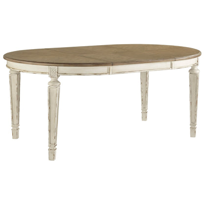 Clear angled shot of the oval dining table, highlighting its two-tone finish, distressed white base, and elegant leg details.