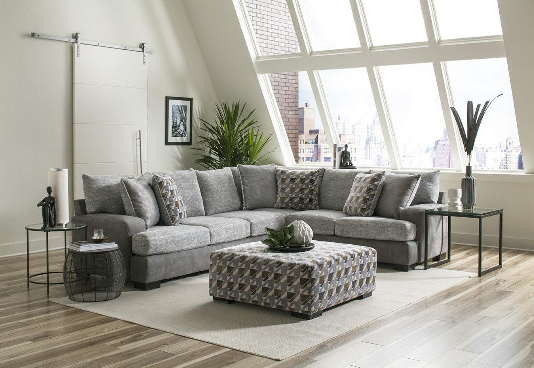 Albany 8784 Dove Grey two-piece sectional in room with separately pictured patterned ottoman